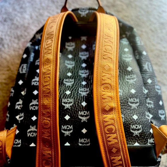 Blackwhite tan. Full size backpack and has cool design.
